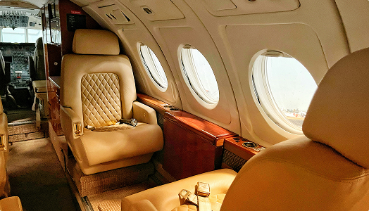 Luxurious leather seats in private jet cabin