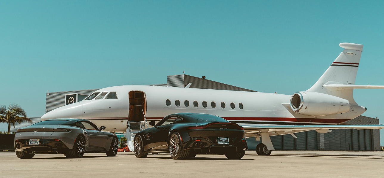 Luxury ground transfer service waiting by a private jet